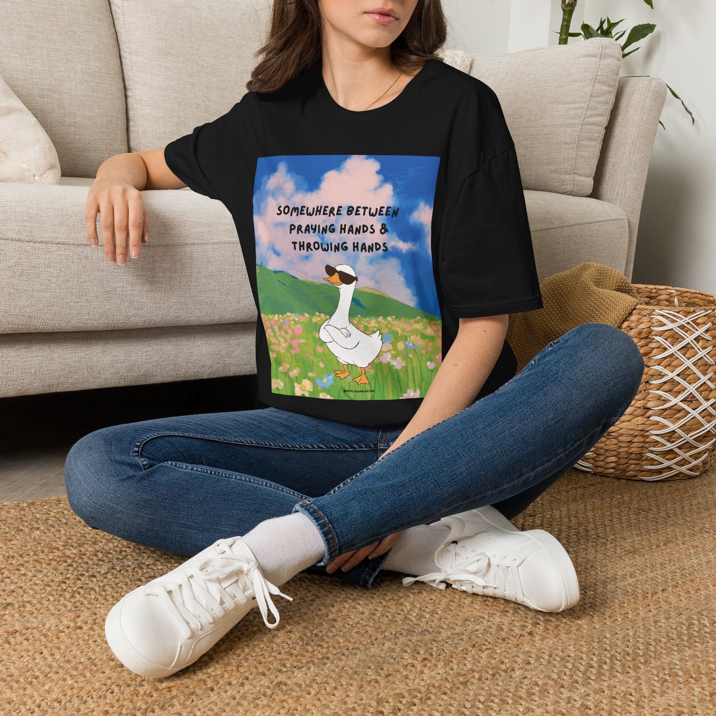 T‑Shirt — "Somewhere Between Praying Hands & Throwing Hands" Cute Goose Tee