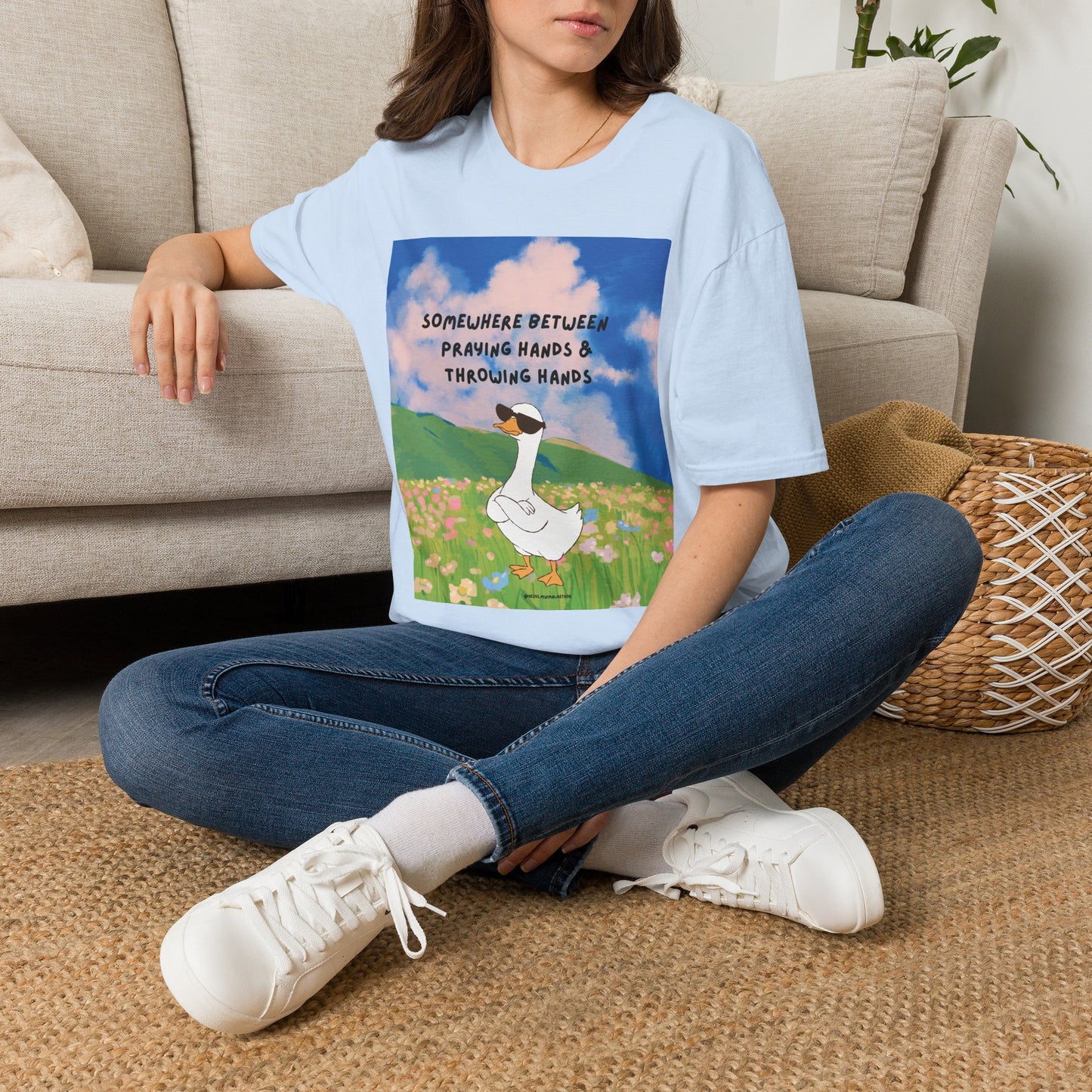 T‑Shirt — "Somewhere Between Praying Hands & Throwing Hands" Cute Goose Tee
