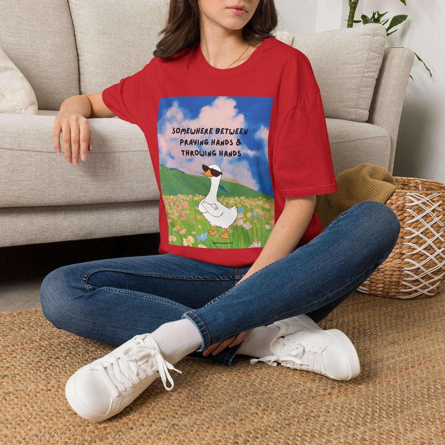 T‑Shirt — "Somewhere Between Praying Hands & Throwing Hands" Cute Goose Tee