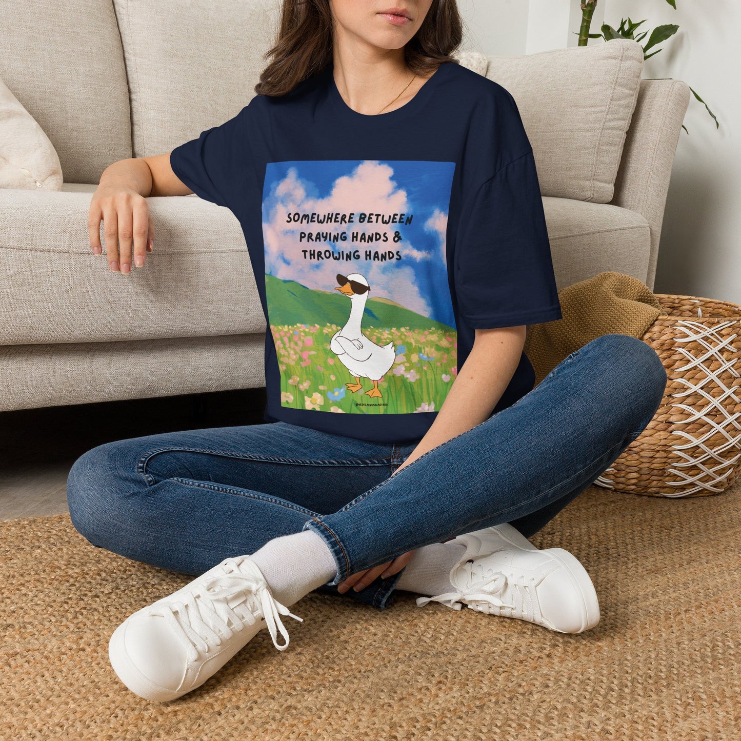 T‑Shirt — "Somewhere Between Praying Hands & Throwing Hands" Cute Goose Tee